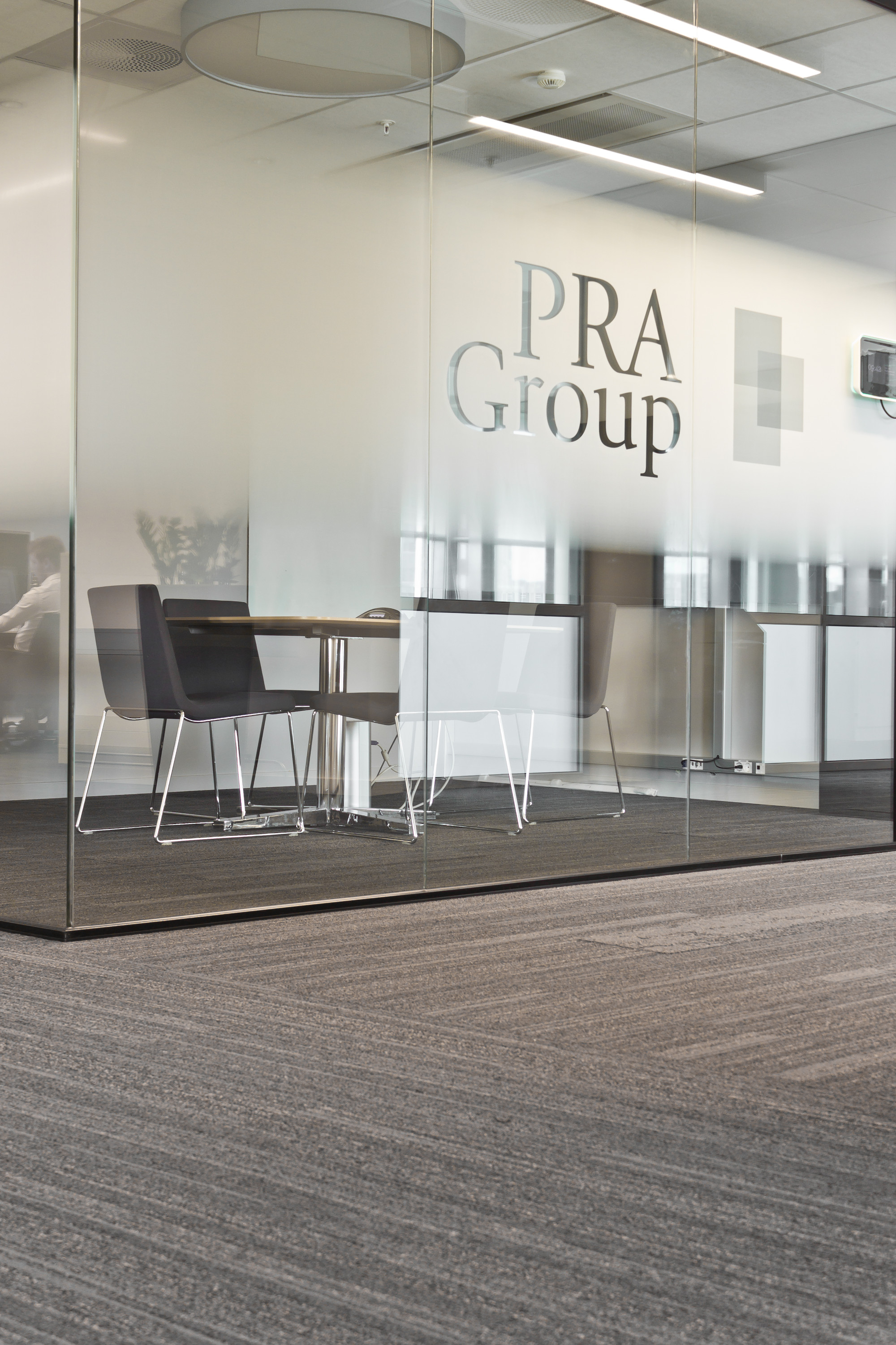 IDENTITET: PRA Group er virksom innen gjeldssanering. Selskapets kjerneverdier, tillit og respekt, har lagt føringer for utformingen av interiøret.