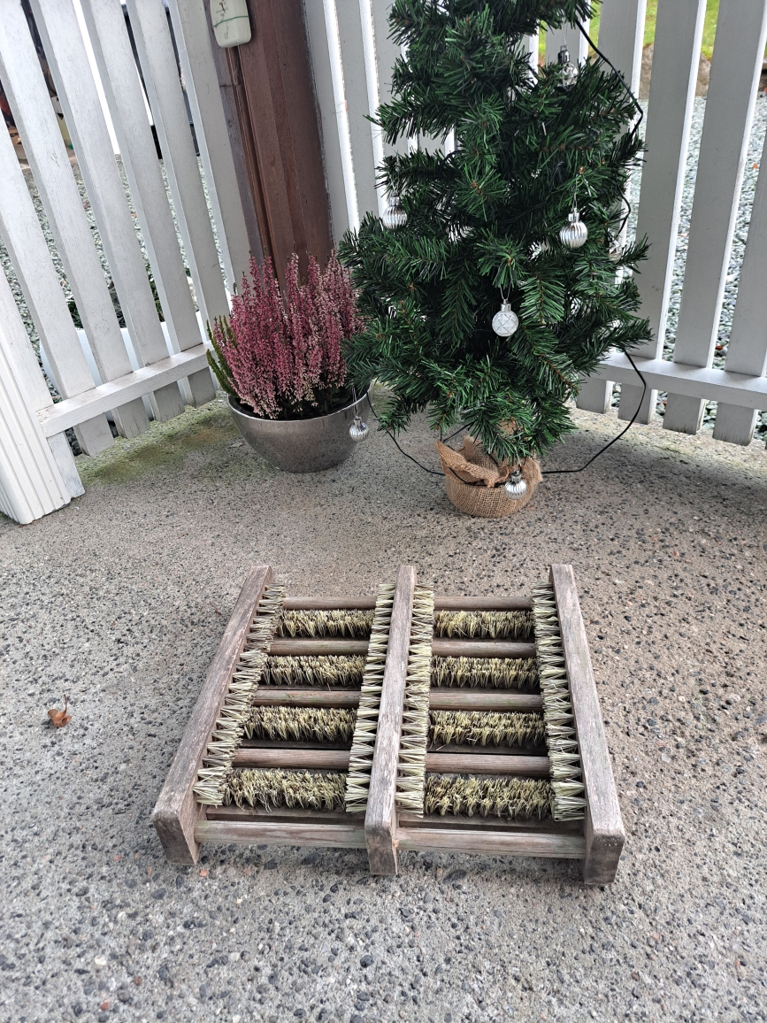 Skobørste ved inngangsparti