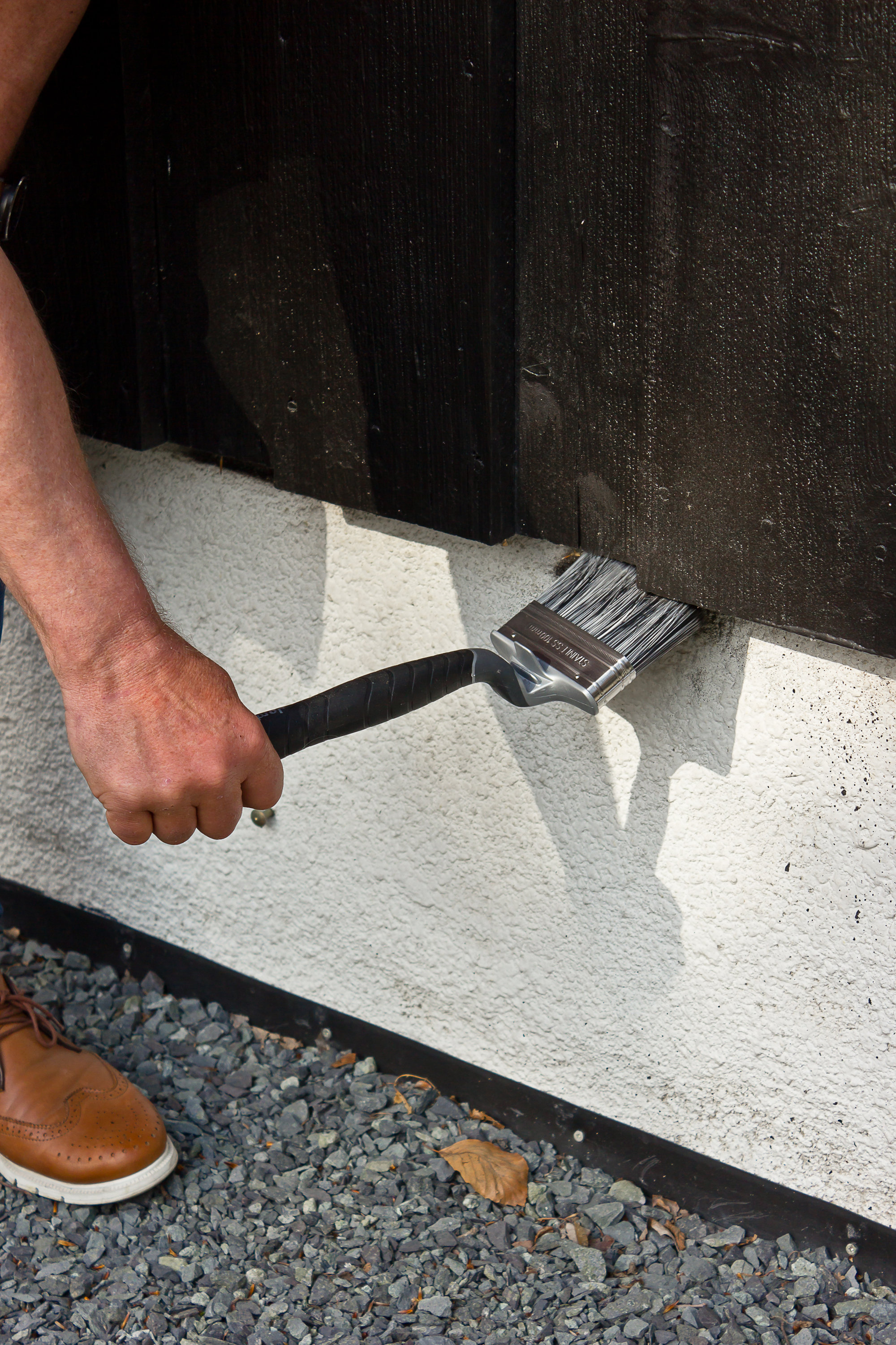 maler med lang pensel