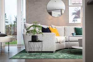 <b>STIL:</b> Farge, form og teppets materiale bidrar til å skape stilen. Et grønt teppe harmonerer godt med natur og grønne planter. Teppet Atelje er fra Golvabia.