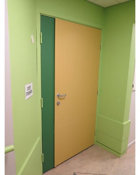Hver korridor fikk sin fargeidentitet. En fikk nisjer i grønne valører med guloker dører.