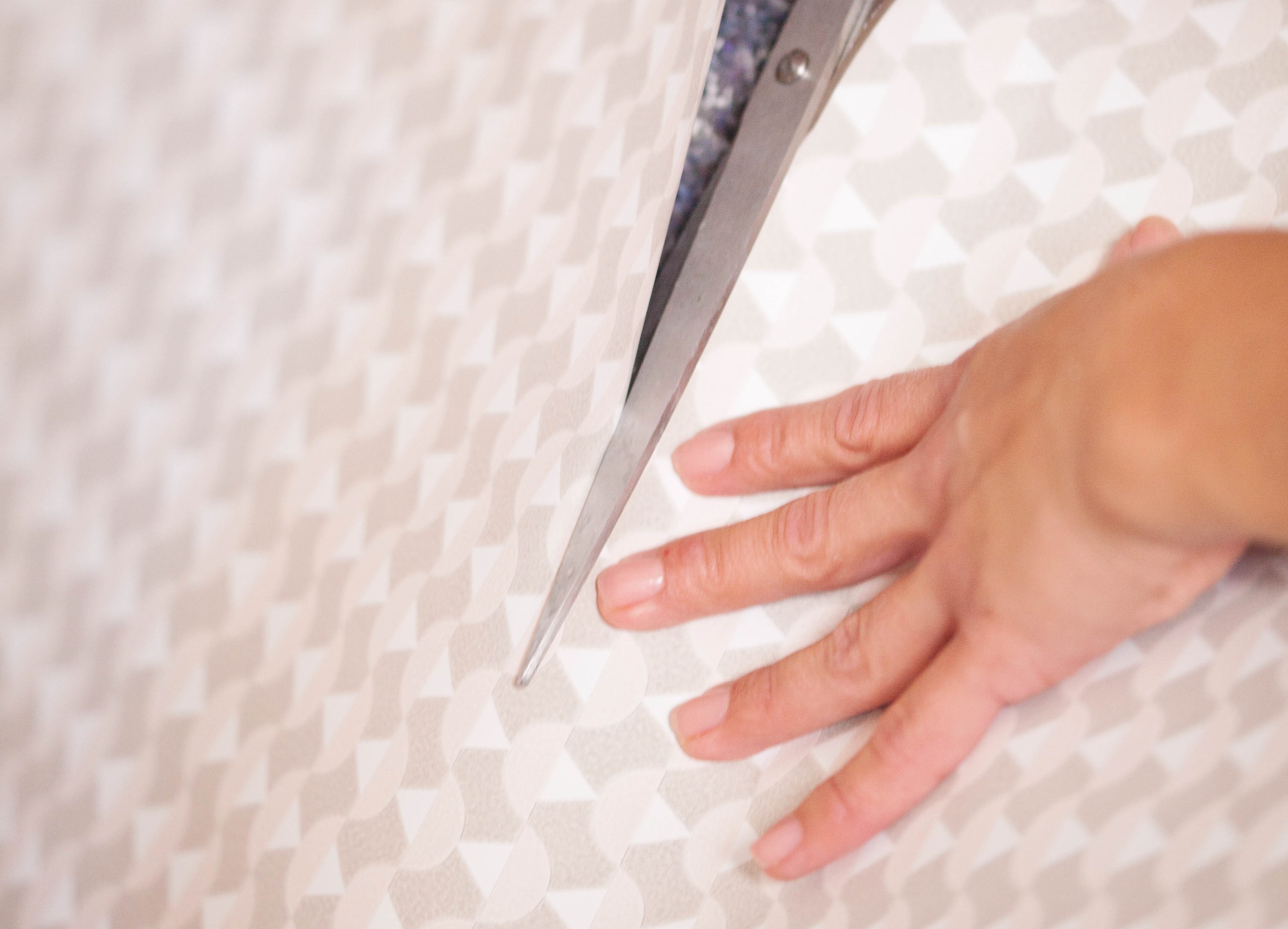 Klippe tapetet nederst