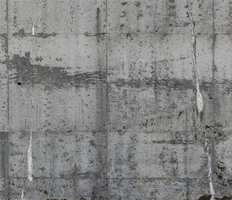 Fototapet av betong fra Inspirasjon Interiør.<br/><a href='https://www.ifi.no//ti-trendy-tapeter'>Klikk her for å åpne artikkelen: Ti trendy tapeter</a><br/>Foto: unknown