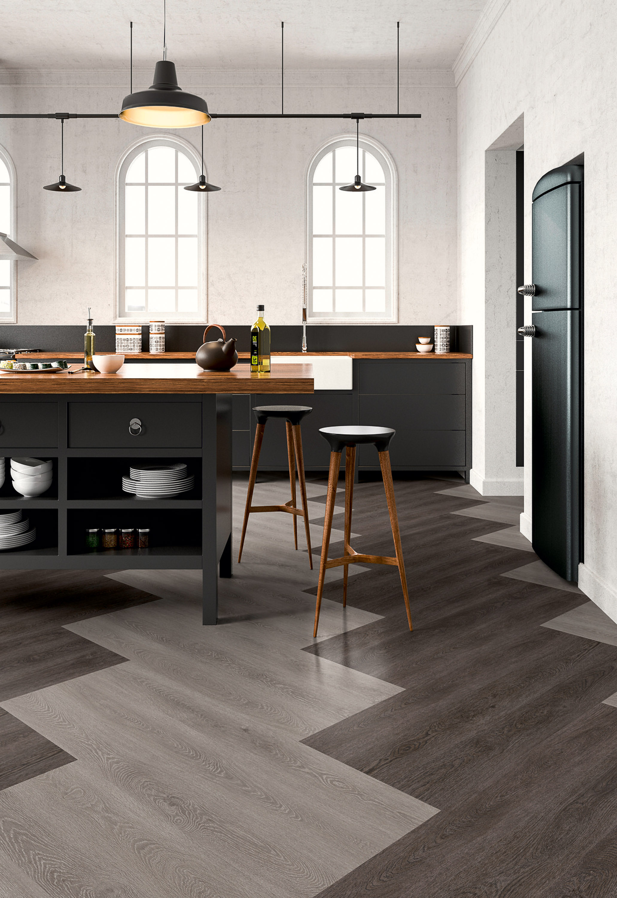 fiskebeinsmønstret gulv i sort og grått, store vinylbord