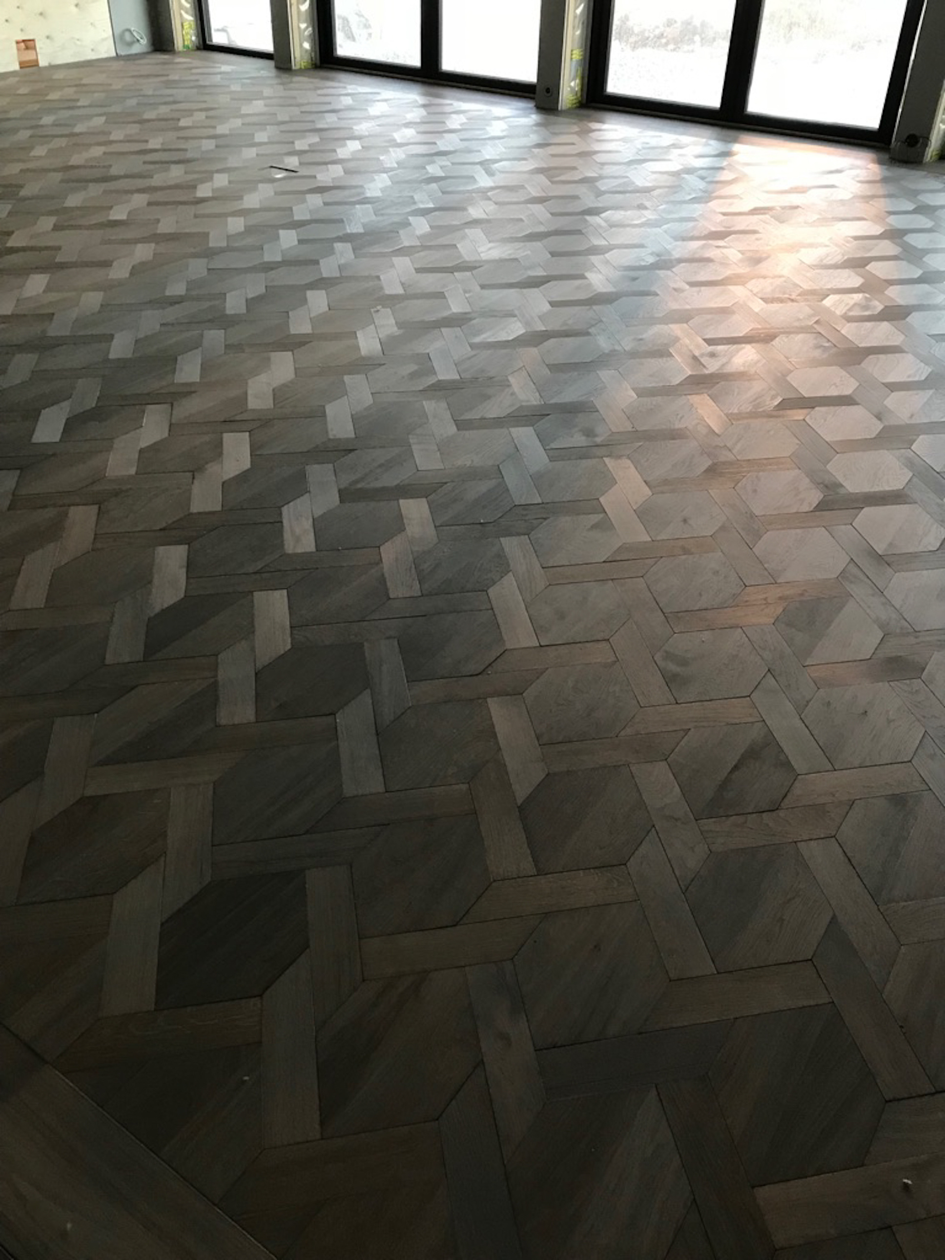 Tregulv i flettemønster