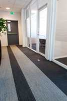 Teppefliser gir deg muligheten til å skape ditt eget særegne gulv ved å kombinere ulike fargenyanser.