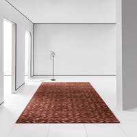 <b>BRENT:</b> Brente rødtoner på tepper og tekstiler bidrar til et lunere, varmere og mer elegant interiør. Teppe fra Sahco/Intag.