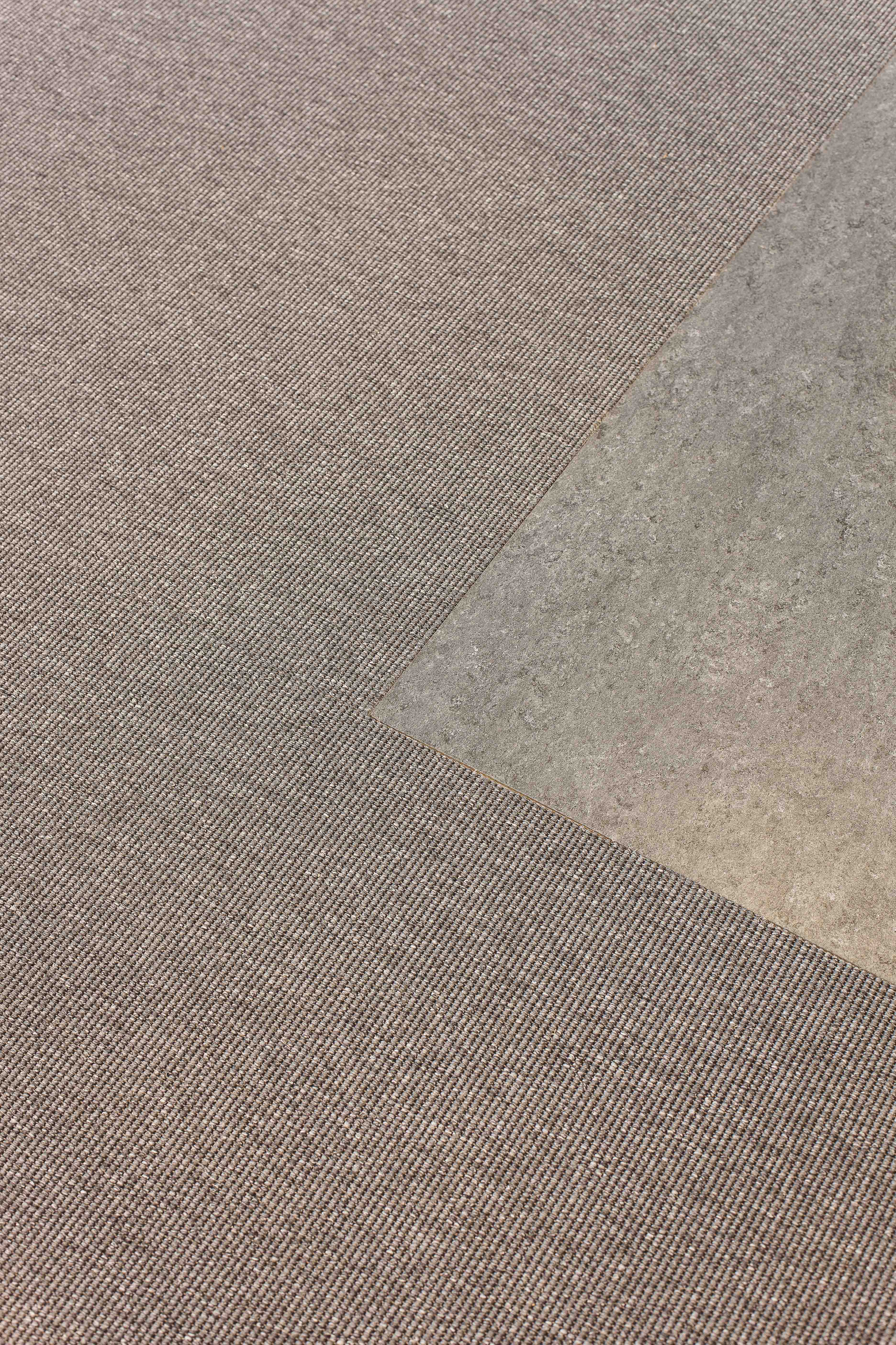 Linoleumsbelegg og tepper sammen.