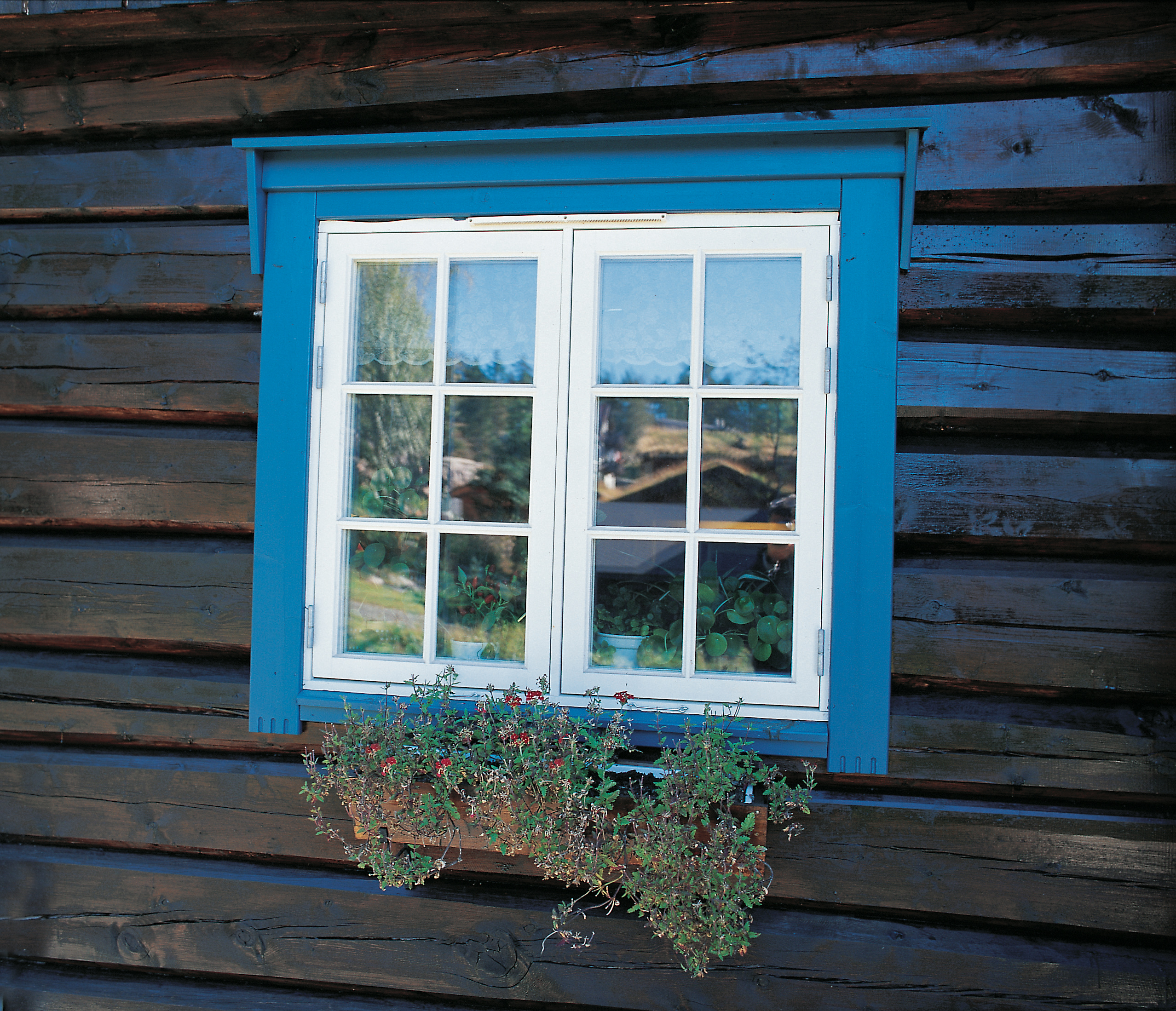 Sprekker i laftet tømmer