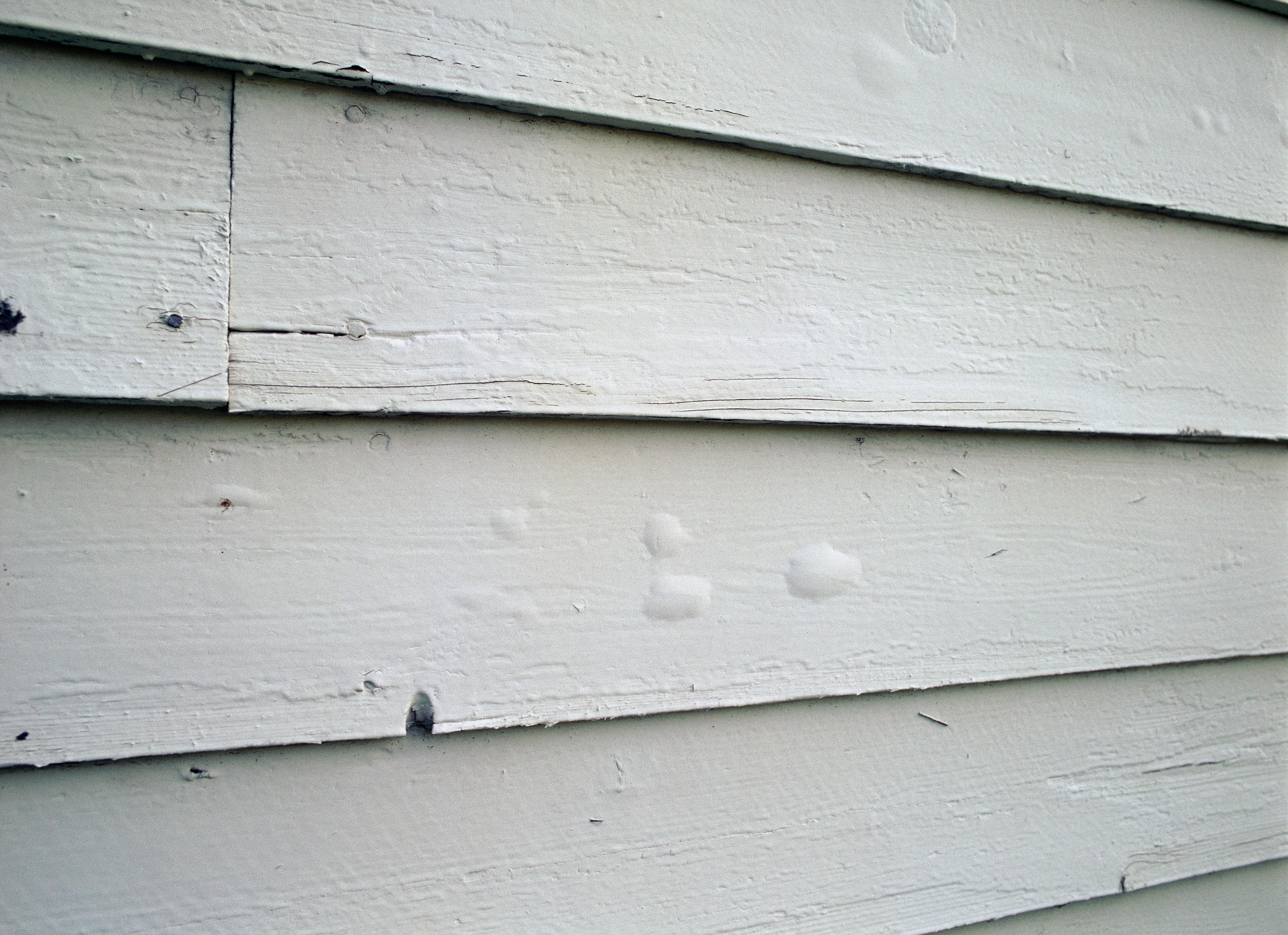 Se etter skader på fasaden