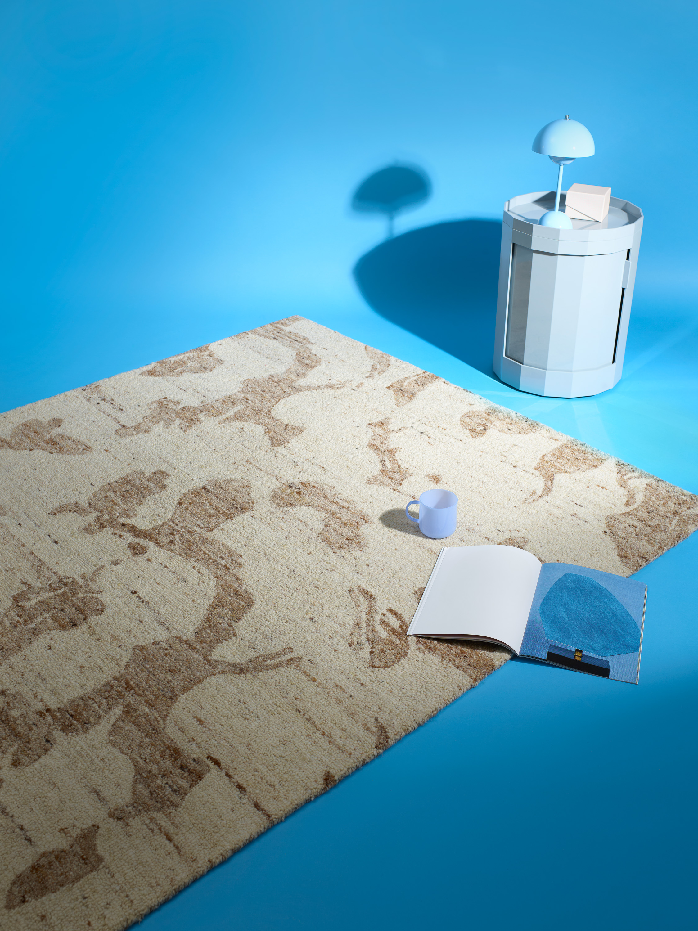 beige teppe med brunaktig møstre