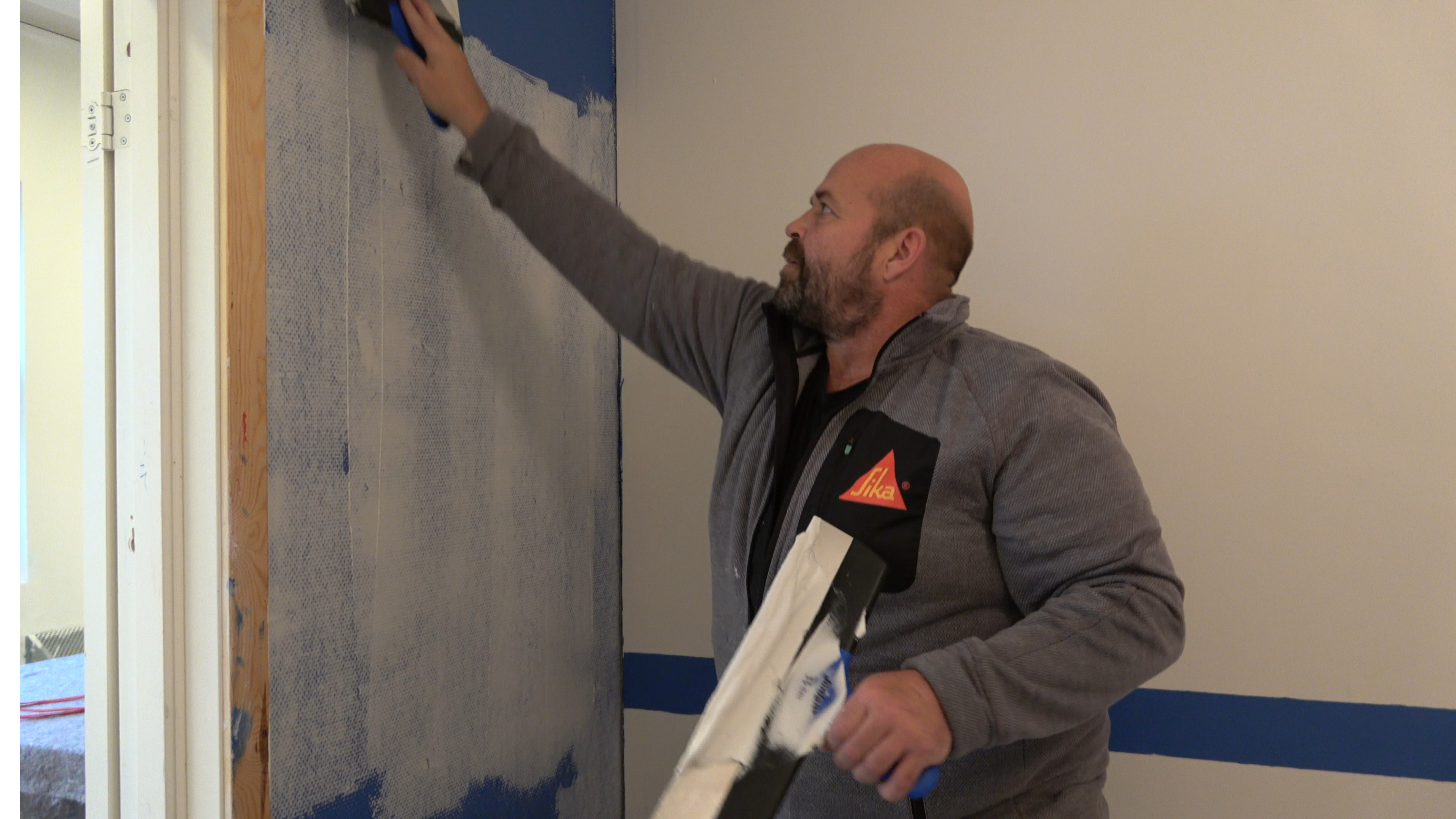 Hvordan sparkle en vegg og bli kvitt glassfiberstrie