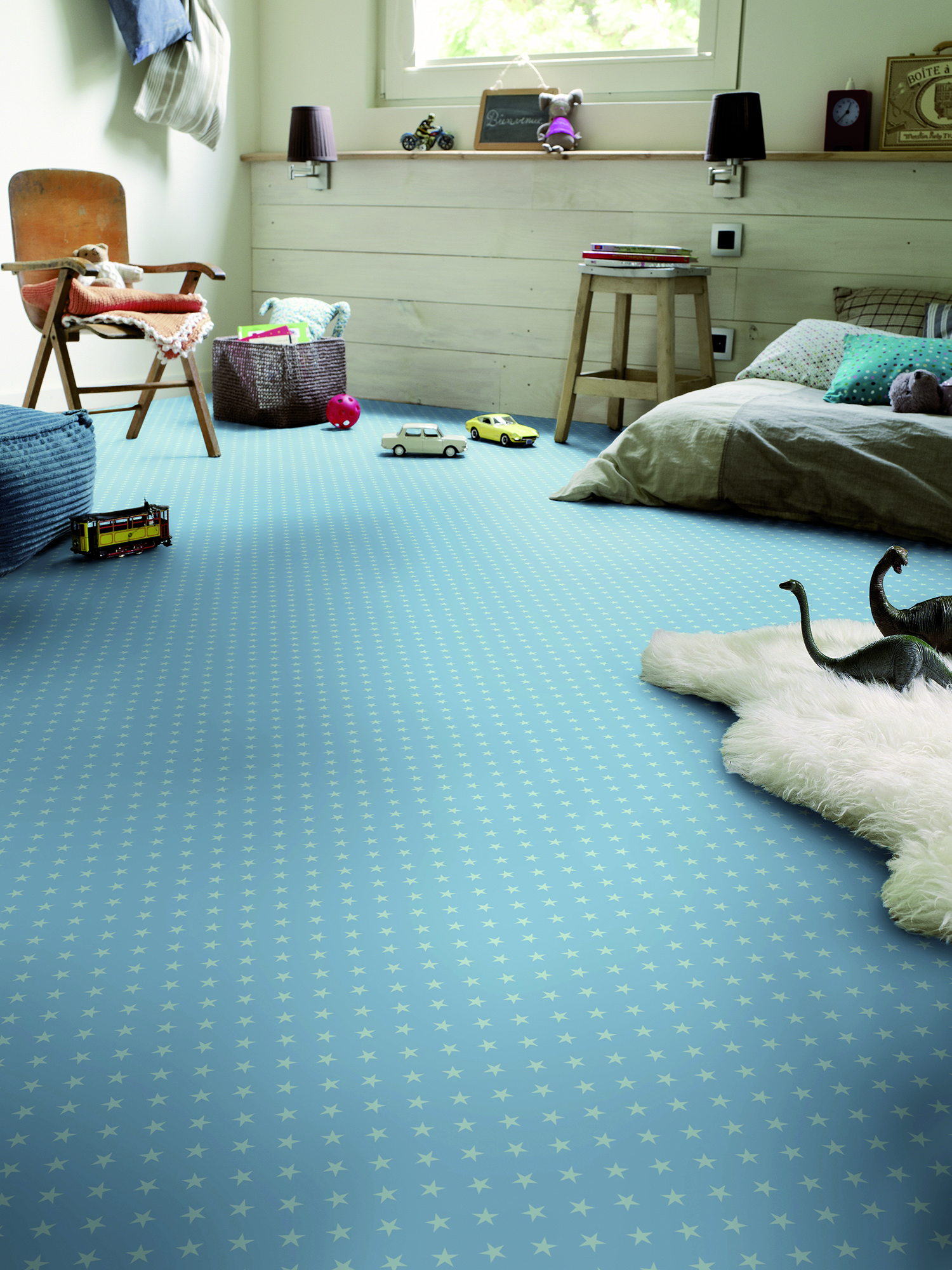 Blå stjernevariant fra Tarkett Kids.
