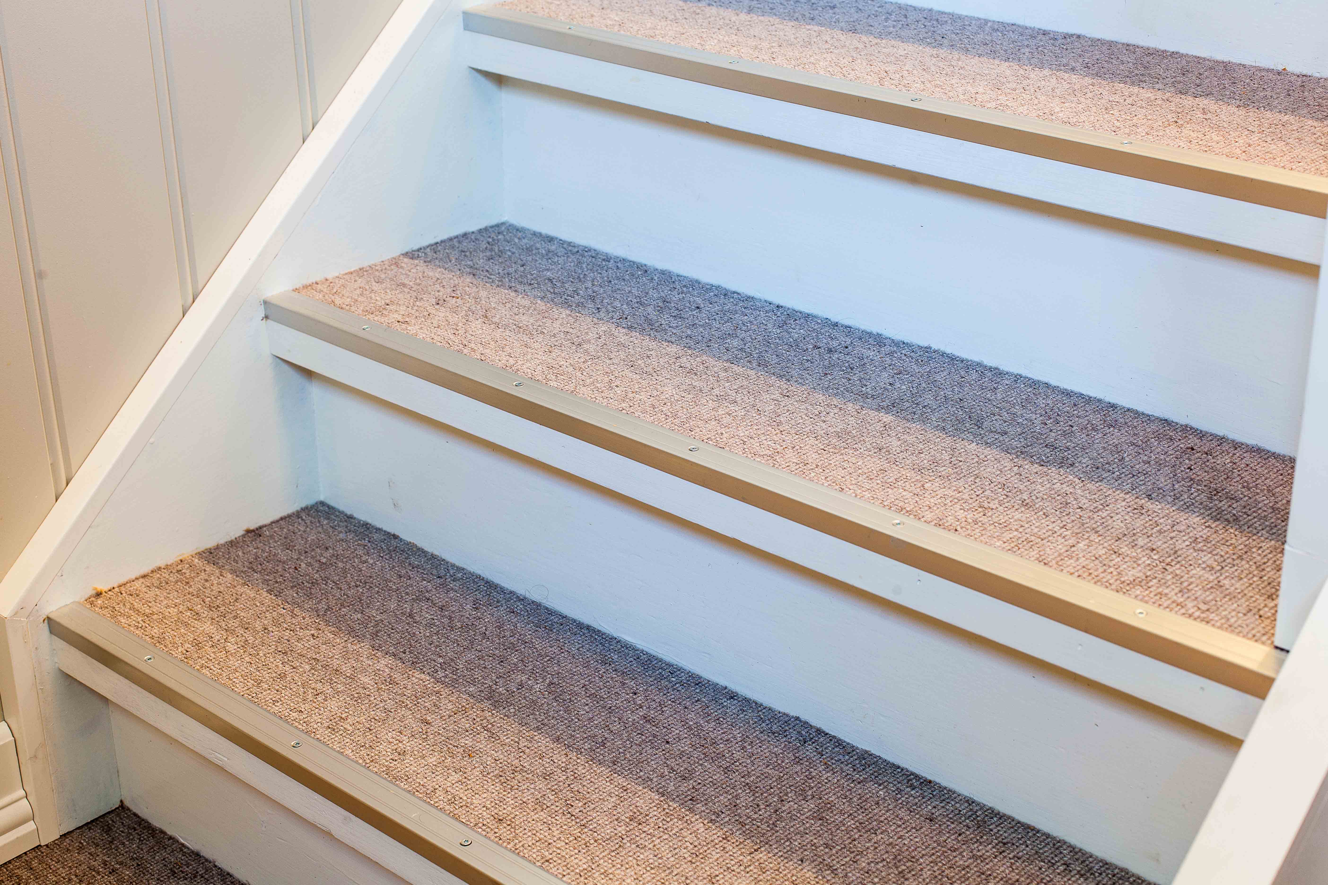 Teppe i trapp i gangen