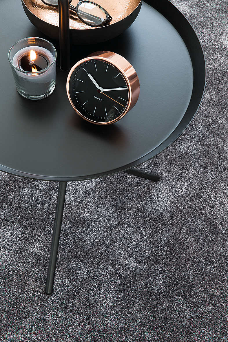 Lunt med teppe i stua